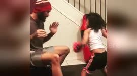 Newsflare Edit - Talented five-year-old boxer trains with her father