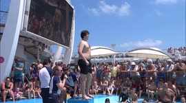 Holidaymakers in Gibraltar take part in hilarious belly flop competition