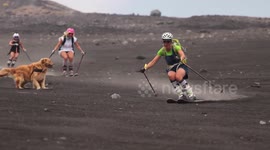 Women go sand-skiing on flanks of Mount Etna