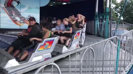 Time lapse of people on a fair ride.