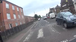 ANGRY DRIVER TRIES TO INTIMIDATE BIKER DOING SPEED LIMIT