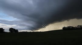 Evening Thunderstorm With Gust Front Looms Over Fields