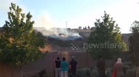 Brush fire burns on hillside in San Jose, California