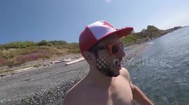 YouTuber encounters huge jellyfish, 'rescues' another.