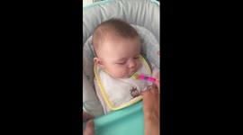 Baby McKenna eats avocado for the first time