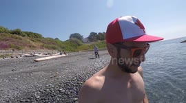 YouTuber swims with huge jellyfish, 'rescues' another (no music)