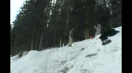 Snowboarder back-flip FAIL!