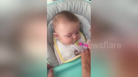 Newsflare Edit - Baby McKenna eats avocado for the first time