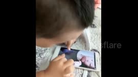 Toddler tries to breastfeed from mum over FaceTime