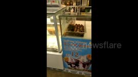 Rat spotted running around on pastries in bakery