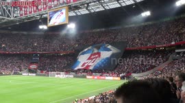 Ajax fans pay tribute to hospitalised player