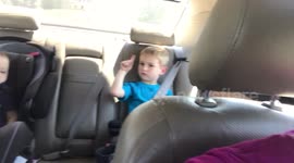 Little boy dances to rap music