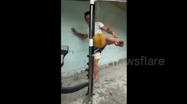 Kung fu master uses leg to kick durian and coconut open