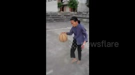 80-year-old granny shows off basketball skills
