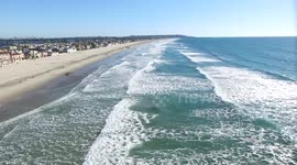 Surfer in Action caught by Drone from above San Diego