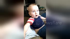 Baby has cutest reaction to dad shaving his beard