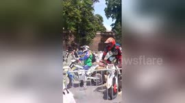 Motorcyclist loses control at race and hits spectator
