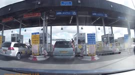 UK driver hits toll booth barrier