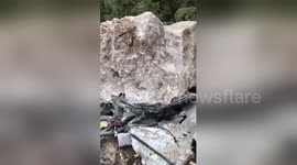 Huge rocks crush vehicles after earthquake