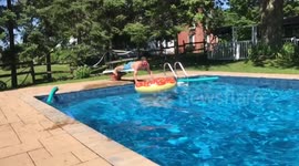 YouTuber pulls off epic somersault into inflatable pool toy