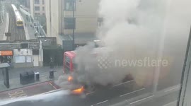 Bus on fire on Finchley Road, London