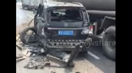 Lorry knocks car in between two vehicles after it changes lane