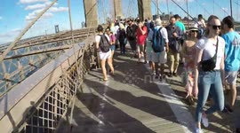 Cyclist sings to clear Brooklyn Bridge bike lane redux