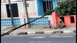 Infant And Mother Living On The Street