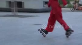 Chinese elderly man plays roller skating