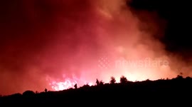 Spectacular video shows firefighters battling blaze near Athens, Greece