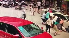 Good Samaritans rescue boy trapped under car