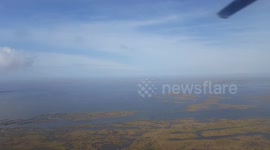 helicopter flight over Grand Isle Louisiana