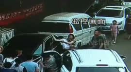Newbie driver pressing accelerator by mistake crashes a woman