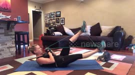 Woman in EPIC workout fail as resistance bands snap, hitting her in face