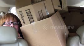 How to make moving fun? Pack up your kids in boxes