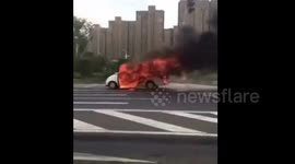 Moving car engulfed by fire