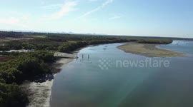 Panning shot of Caboolture river at low tide