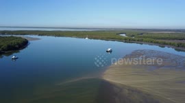 Circling shot of boats in river