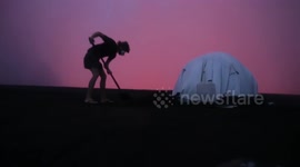 Adventurer sleeps on top of Vanuatu's Marum volcano, one of the most active lava lakes on Earth
