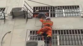 Girl miraculously saved from apartment fall by landing on air conditioning unit