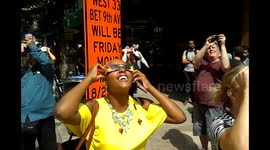 New Yorkers watch total solar eclipse