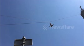 Guy scared of heights tries to conquer his fear with a zip-line