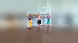Little girl goes dancing dressed up as hotdog