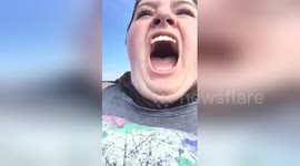 US woman has most extreme reaction to roller coaster EVER