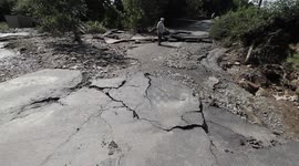 Severe Road Damage After Thunderstorm Flood Event - N. Ireland