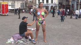Naked body painting in Dam Square