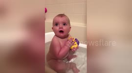 Baby is terrified by mother's face mask