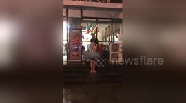 Hair salon manager punishes employees with cold water bucket