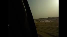 United Arab Emirates. UAE. Safari Desert. 4x4 cars running in the dunes. Inside the car (1)