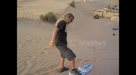 United Arab Emirates. UAE. Safari Desert. Sand Boarding with fall. 2016